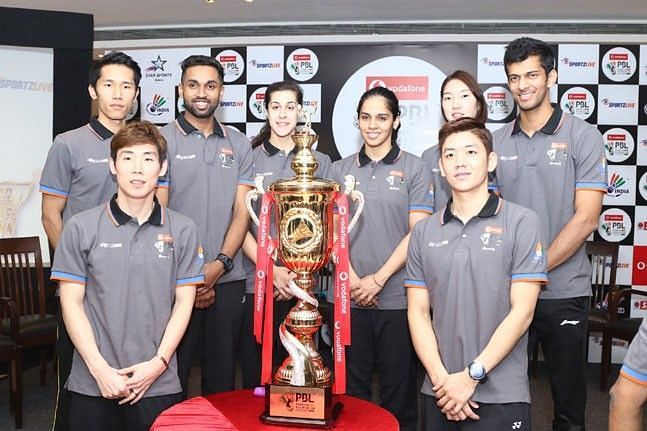 Star players Saina Nehwal, Carolina Marin, H.S. Prannoy at the trophy unveiling of PBL-3 in New Delhi.