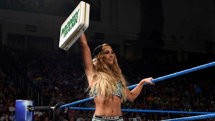 Carmella still holds the contract and could decide to use it this weekend