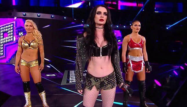 images via 411mania.com Paige returned to the ring and she didn&#039;t come alone.