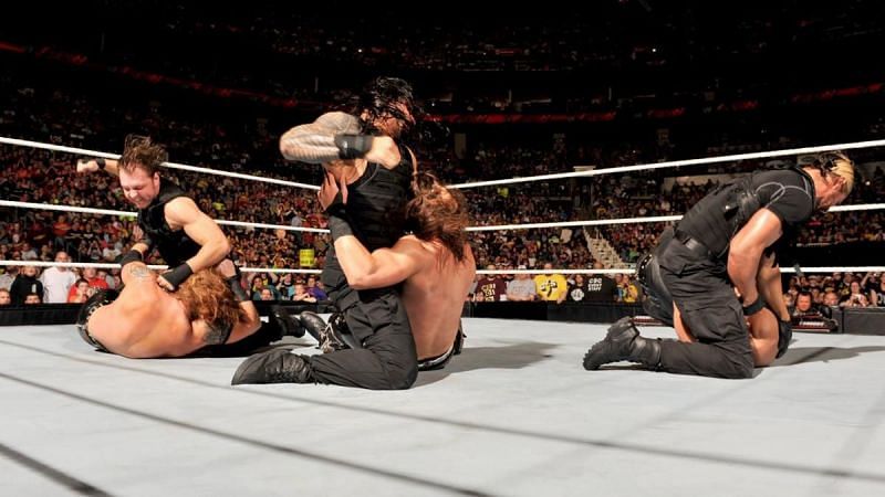 The Shield quickly lays waste to the band.