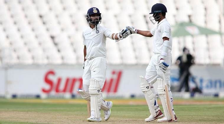 Image result for india vs south africa 2018 3rd test: Vijay and Kohli
