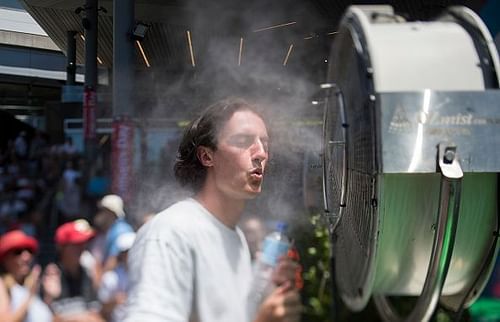 A fan takes a moment to cool down in the Australian heat