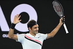Federer keeps hunt for Slam number 20 on track
