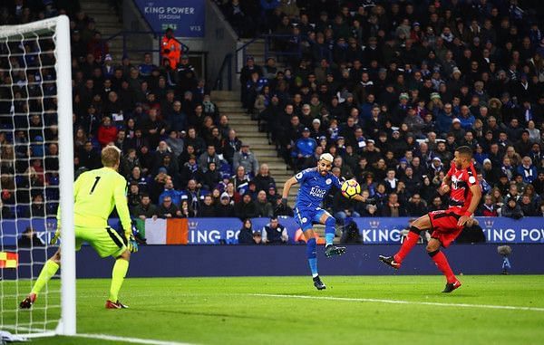 Riyad Mahrez of Leicester City scores the opening goal during the Premier League match between Leicester City and Huddersfield Town at The King Power Stadium on January 1, 2018 in Leicester, England. (Dec. 31, 2017 - Source: Clive Mason/Getty Images Europe) 