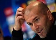 Real Madrid's French coach Zinedine Zidane gives a press conference following a training session at Valdebebas Sport City in Madrid on December 5, 2017 on the eve of their Champions' League match against Borussia Dortmund. / AFP PHOTO / PIERRE-PHILIPPE MARCOU (Dec. 4, 2017 - Source: AFP)