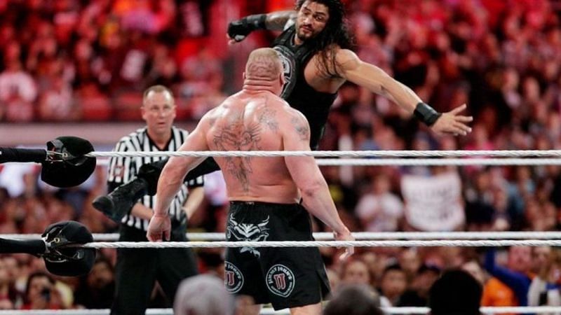 Roman Reigns and Brock Lesnar battling it out at WrestleMania 31
