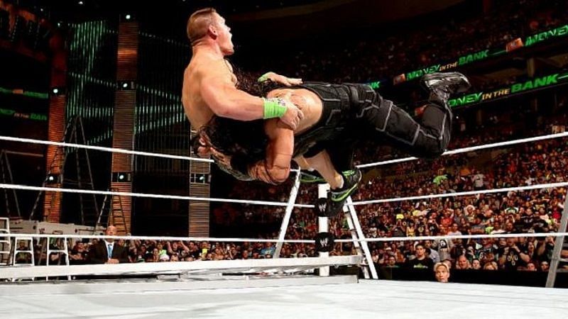 Roman Reigns and Rhyno share the spear on Monday Night Raw 