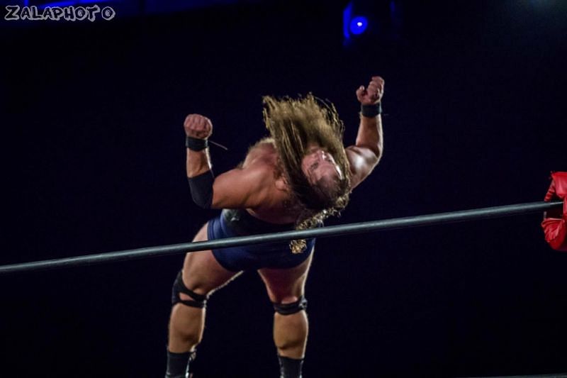Todd Hanson performs his famous moonsault, a move primarily utilized by much smaller wrestlers.