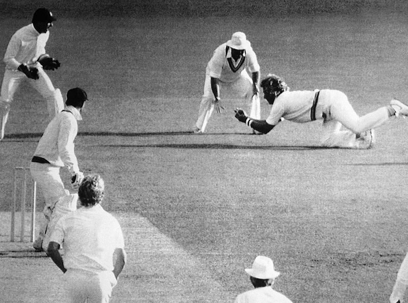Ian Botham completes a catch at 2nd slip