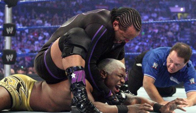 MVP is performing a signature move on Shelton Benjamin