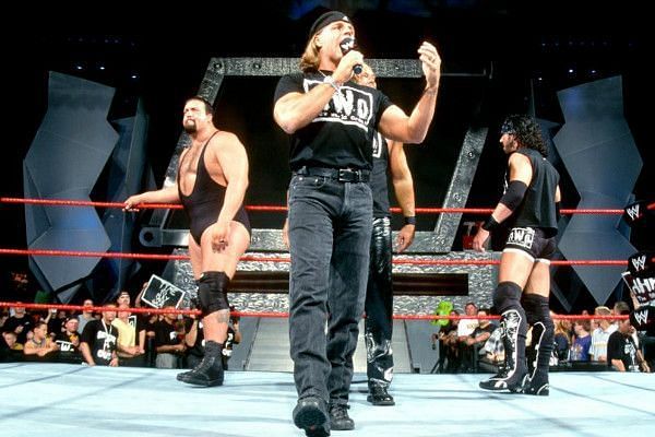 Shawn Michaels as a member of the NWO, alongside X-Pac, Kevin Nash, and Big Show