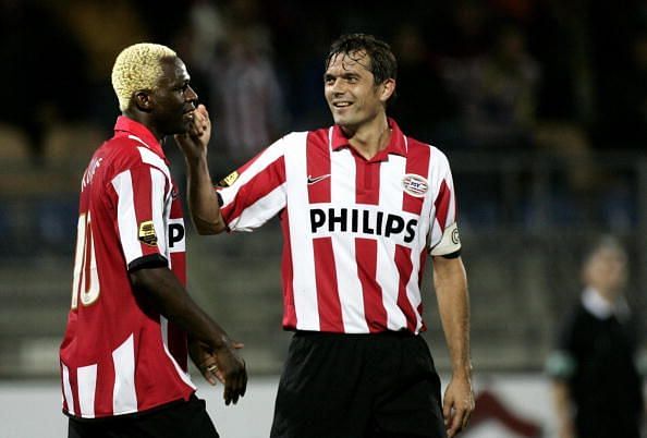 Cocu (R) in action for PSV