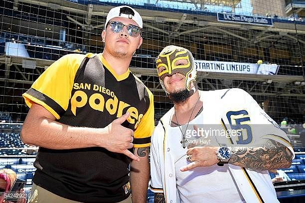 Dominic Gutierrez (left) with his father Rey Mysterio 