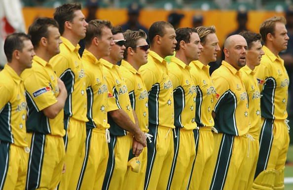 The Australian team sing the national anthem