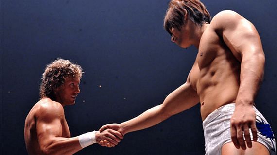 Kenny Omega shaking the hand of his former Tag team partner, Kota Ibushi. 