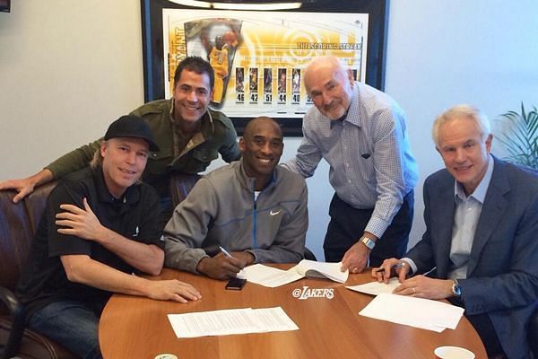 Kobe Bryant signing his last contract with the Los Angeles Lakers on Nov. 25th, 2013.