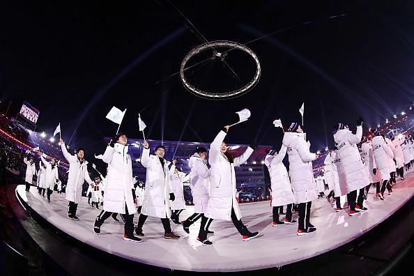 North Korea and South Korea athletes walk out together