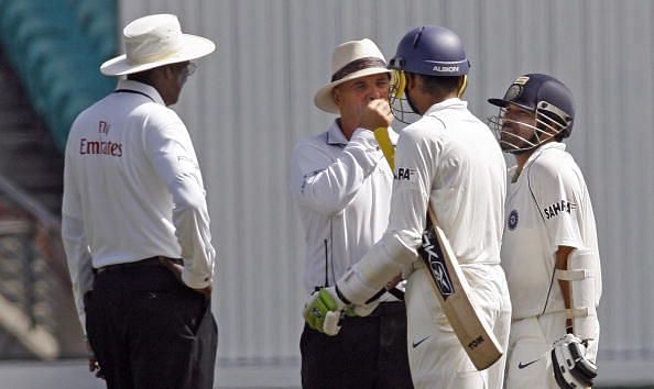 Harbhajan and Tendulkar with the umpires at Sydney in 2008