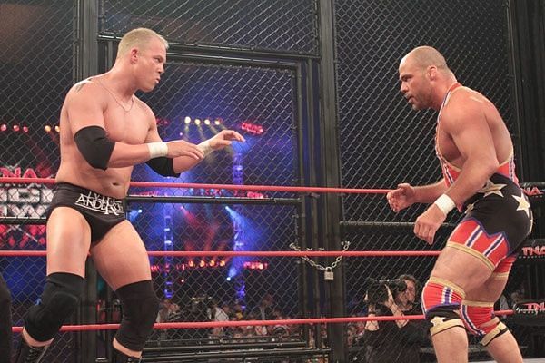 This amazing cage match took place in TNA during the Bischoff-Hogan era