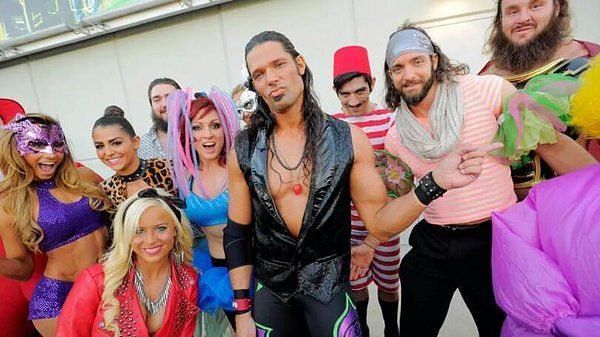 Braun Strowman is at the far right of Adam Rose.  Also pictured is Becky Lynch