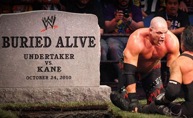 Kane and Undertaker in a Buried Alive match