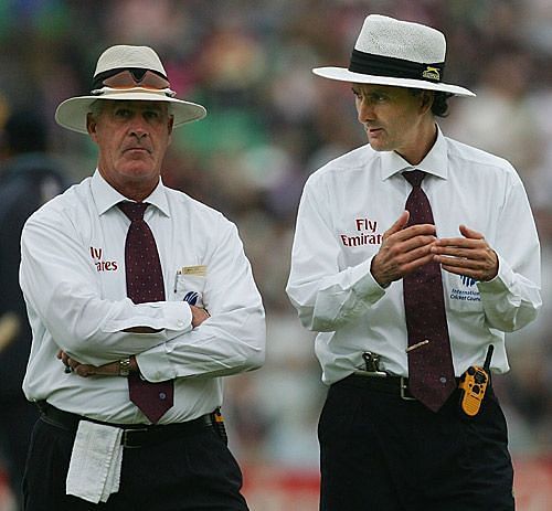 Billy Bowden with a walkie-talkie hooked onto his belt loop