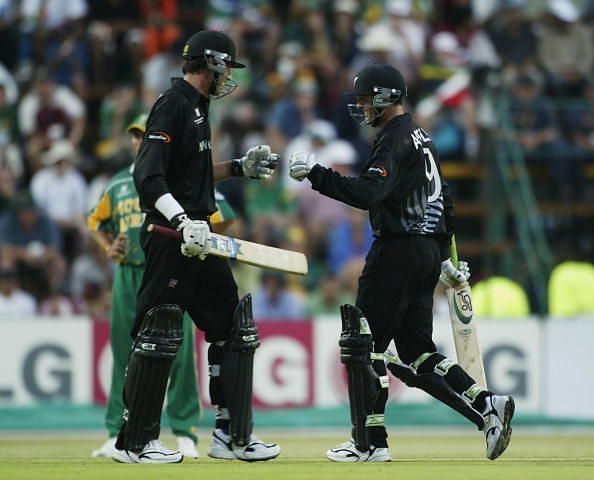 Fleming (L) and Astle of New Zealand In Action