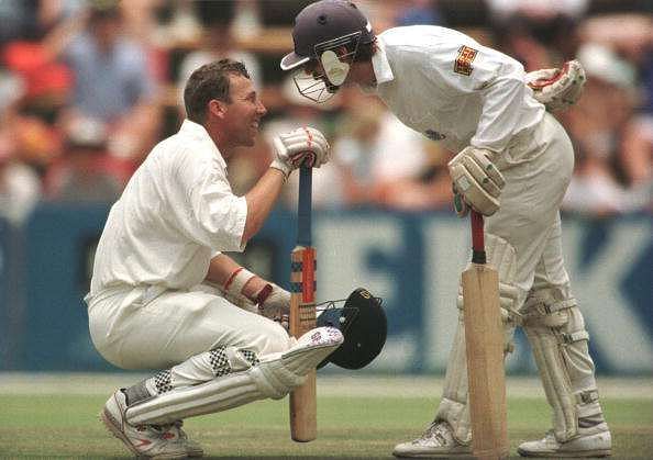 Athers and Jack Russell in conversation during their fabled partnership versus South Africa in 1995