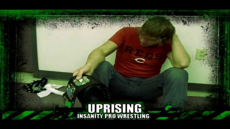 Dean Ambrose (Jon Moxley) With the Insanity Pro Wrestling belt.