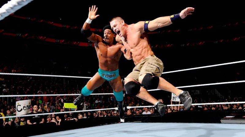 Darren Young and John Cena face each other in the ring