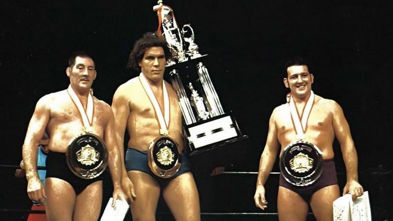 Karl Gotch, Andre the Giant, and Billy Robinson take a picture in the ring