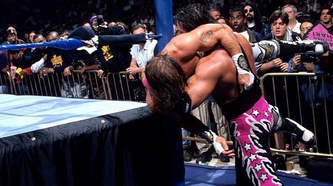 Bret Hart sets Shawn Michaels up for another astonishing gap in logic, as Hart broke a countout at NINE to deliver this backbreaker.