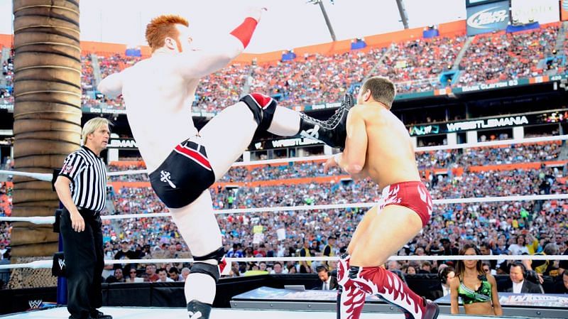 Sheamus delivering a brogue kick to Daniel Bryan