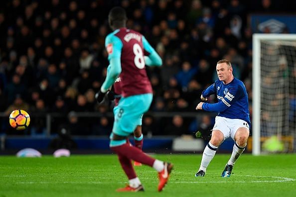 Rooney completes hattrick by shooting from his own half