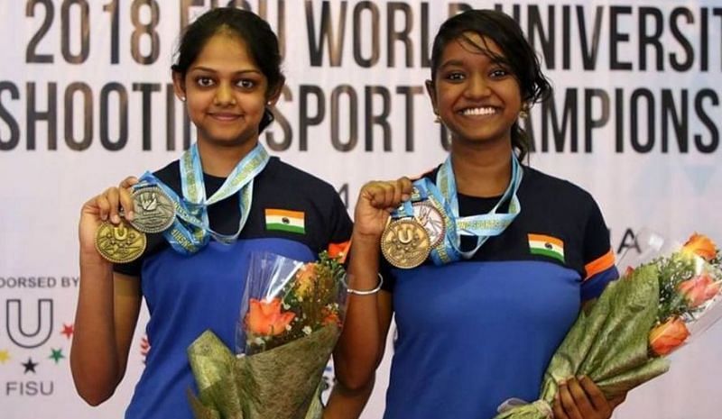 Elavenil and Meghana with their medals