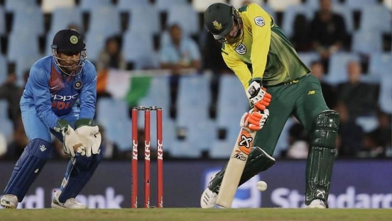 South Africa batsman Heinrich Klaasen plays a shot as India&#039;s wicketkeeper MS Dhoni watches during the second T20 match between South Africa and India at Centurion Park in Pretoria, South Africa on Wednesday, February 21, 2018.