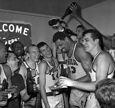 Wilt Chamberlain and the Sixers celebrate their historic season and Finals win.