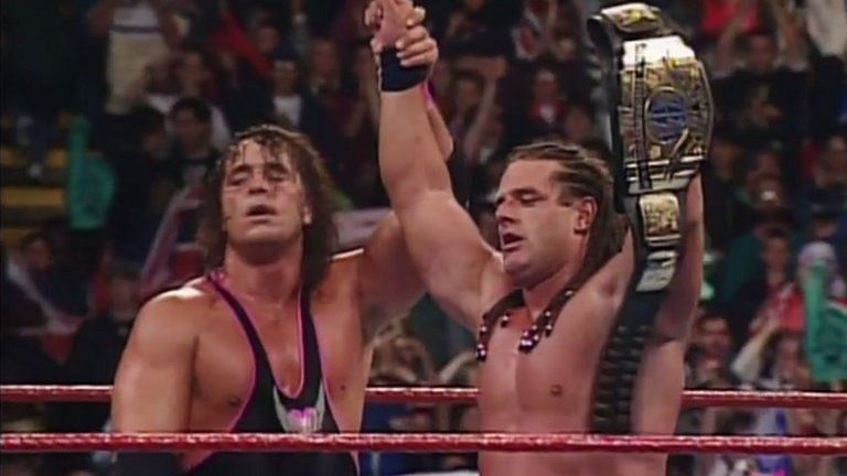 Bret Hart congratulates his brother-in-law after a legendary match.