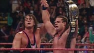 Bret Hart congratulates his brother-in-law after a legendary match.