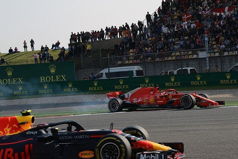 Max Verstappen &amp; Sebastian Vettel after having crashed in China