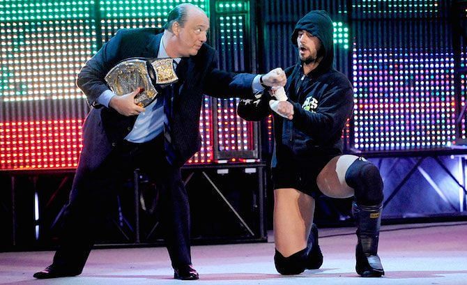 Paul Heyman with CM Punk as the WWE Champion 