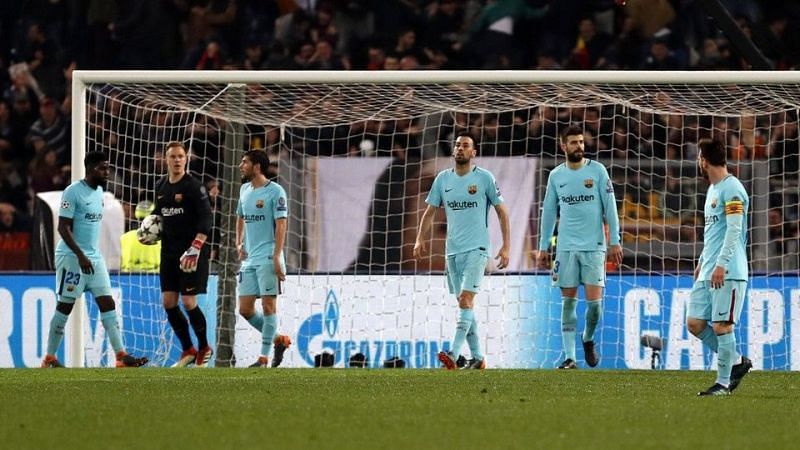 Barcelona were stunned 3-0 by Roma