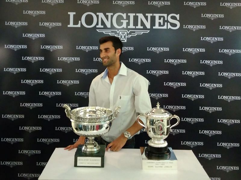 Yuki Bhambri all smiles after receiving the Conquest Roland Garros timepiece