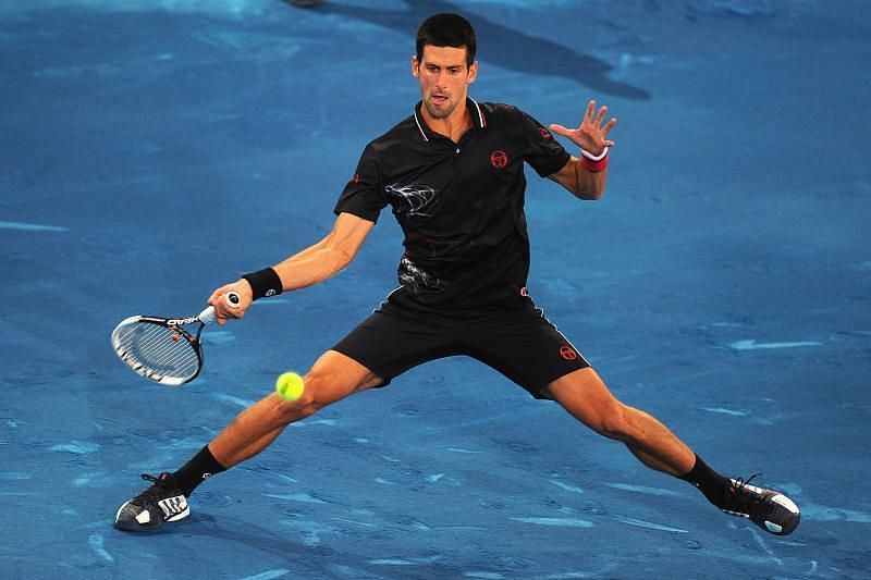 Image result for Novak Djokovic sliding