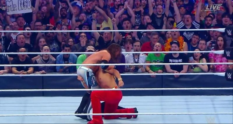 Nakamura low-blows Styles at Wrestlemania