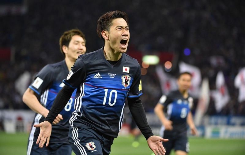 Kagawa celebrating after scoring against Thailand
