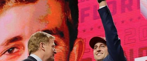 UCLA's Josh Rosen, right, gestures next to commissioner Roger Goodell after being selected by the Arizona Cardinals during the first round of the NFL football draft, Thursday, April 26, 2018, in Arlington, Texas. (AP Photo/David J. Phillip)