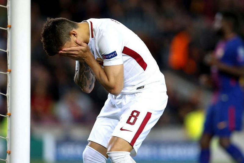 Diego Perotti reacts after his miscued header