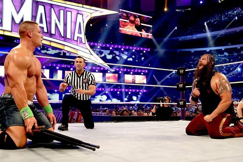 Bray Wyatt begs John Cena to strike him down with a chair.