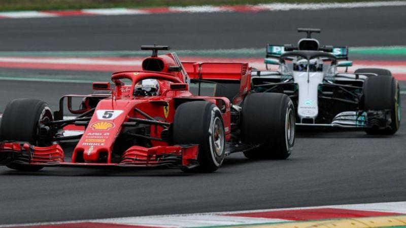 Sebastian Vettel being followed by Valtteri Bottas